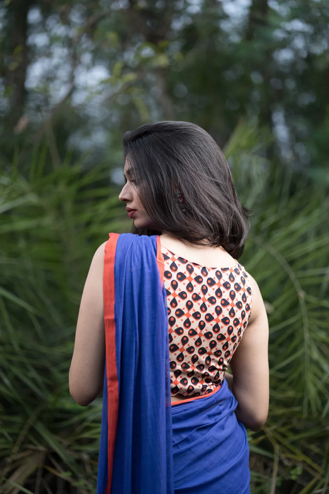 Orange Sleeveless hand print Saree Blouse with floral motifs - I Love Sarees