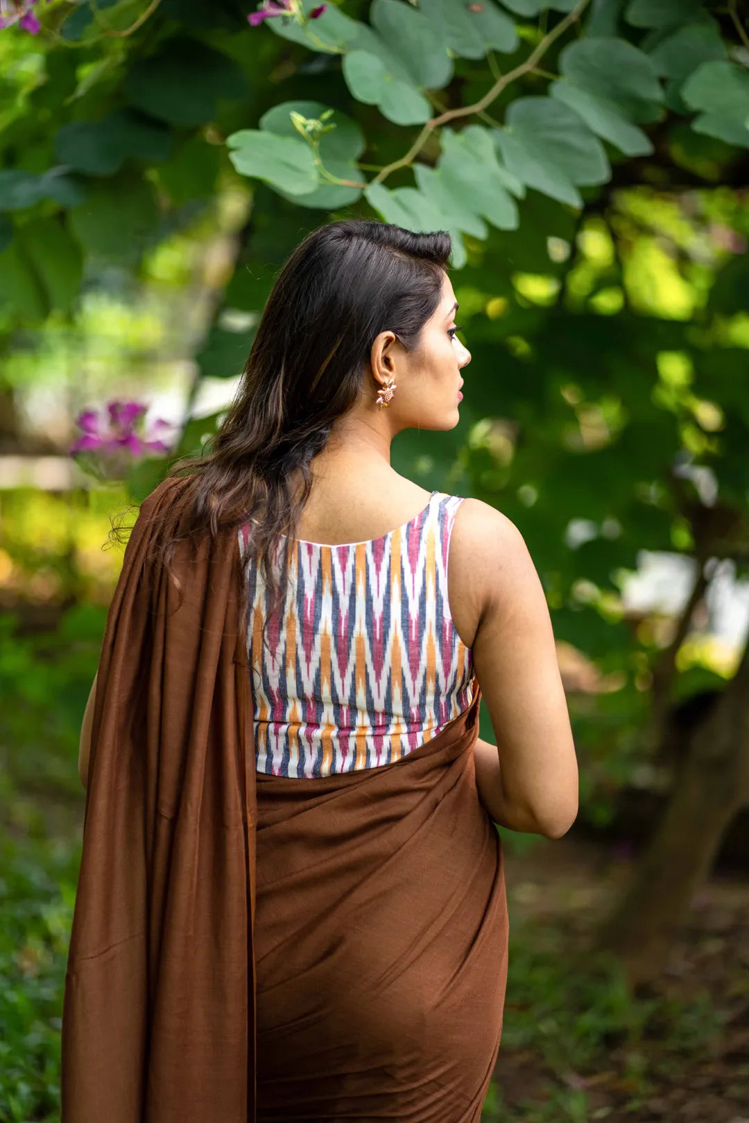 Powder white sleeveless Ikkat saree blouse - I Love Sarees
